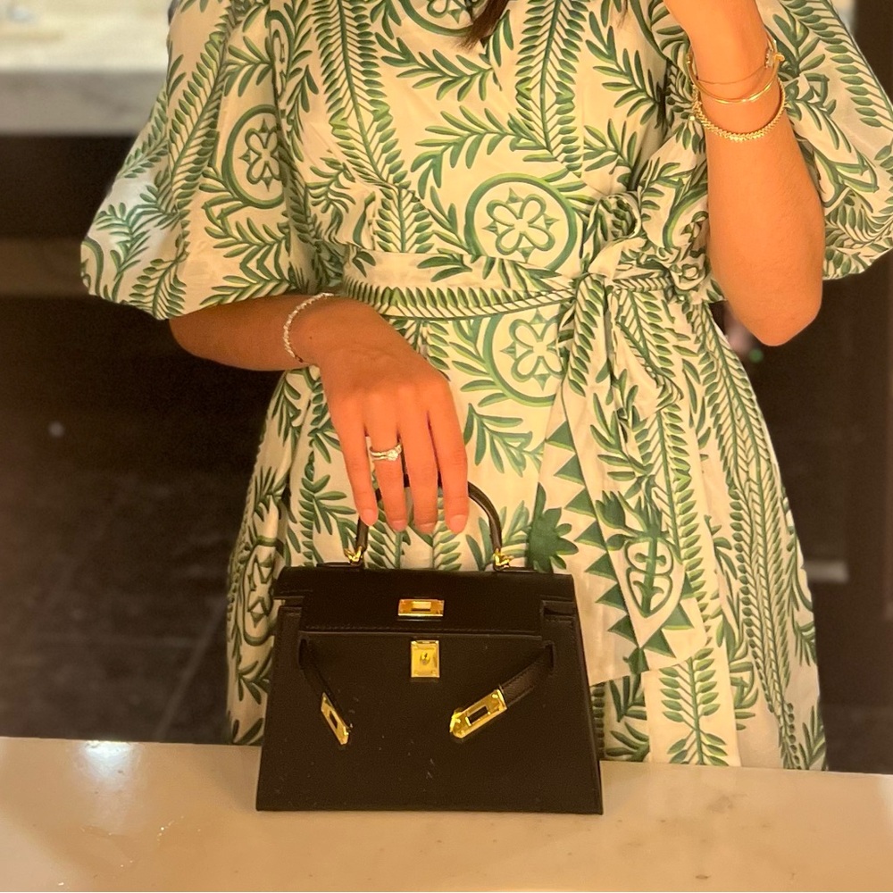 Elegant Black Handbag with Gold Accents